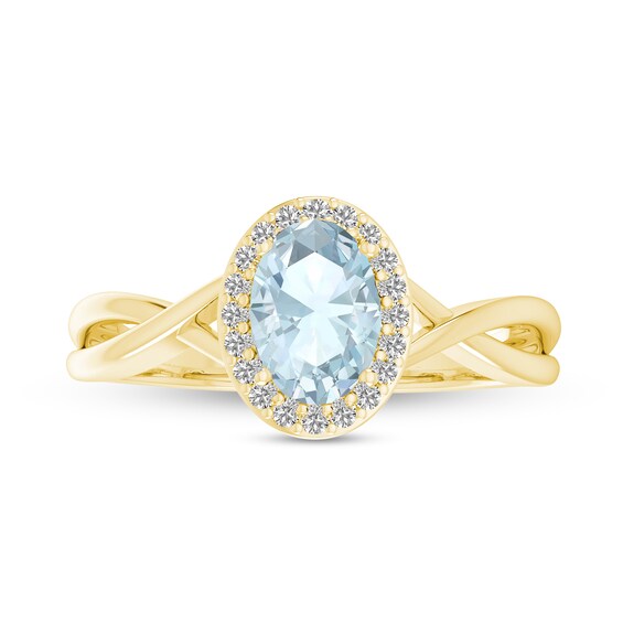 Oval Aquamarine and 1/15 CT. T.w. Diamond Frame Crossover Shank Ring in 10K Gold