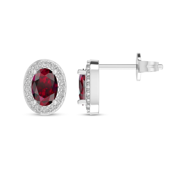 Oval Ruby and 1/10 CT. T.w. Diamond Frame Stud Earrings in 10K White Gold