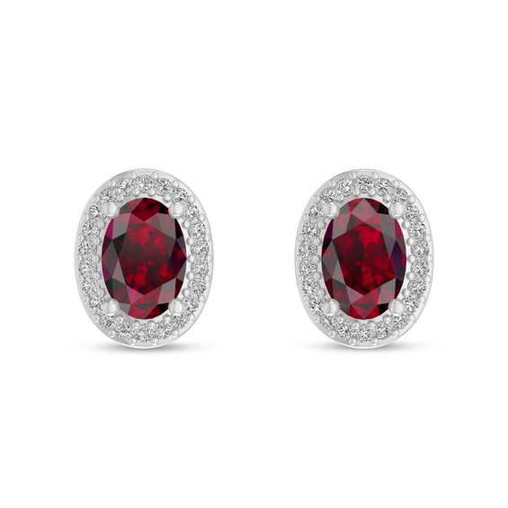 Oval Ruby and 1/10 CT. T.w. Diamond Frame Stud Earrings in 10K White Gold
