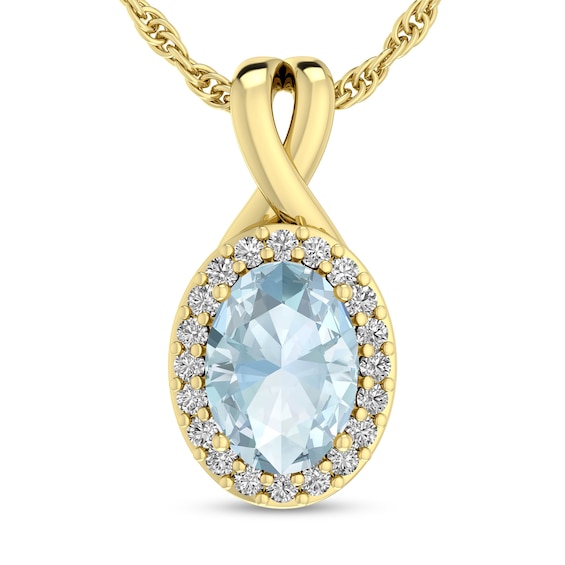Oval Aquamarine and 1/15 CT. T.w. Diamond Frame Split Bail Pendant in 10K Gold