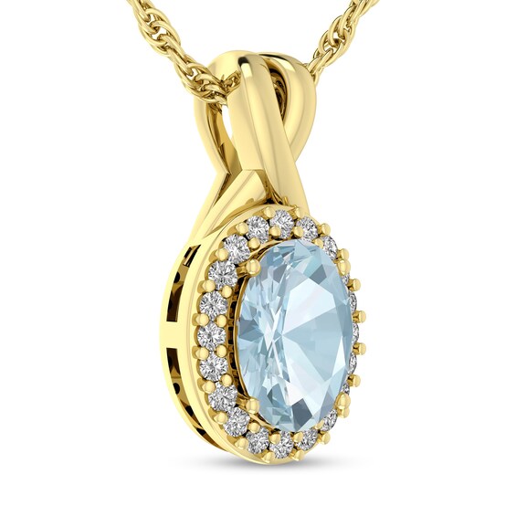 Oval Aquamarine and 1/15 CT. T.w. Diamond Frame Split Bail Pendant in 10K Gold