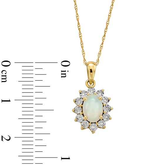 Oval Opal and Diamond Accent Sunburst Frame Pendant in 10K Gold