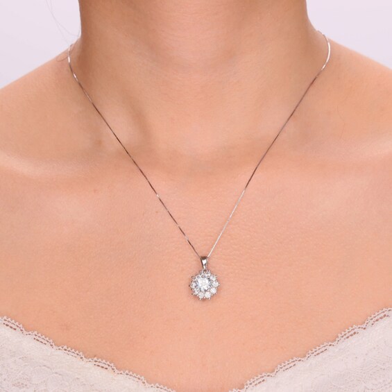 7.0mm Sky Blue Topaz and White Lab-Created Sapphire Sunburst Frame Pendant in Sterling Silver