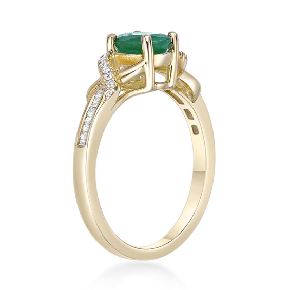 Oval Emerald and 1/6 CT. T.w. Diamond Crossover Split Shank Ring in 10K Gold