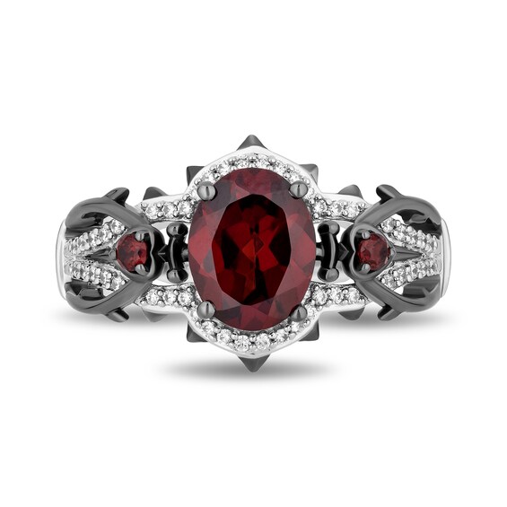 Enchanted Disney Villains Evil Queen Oval Garnet and 1/6 CT. T.w. Diamond Heart with Dagger Ring in Sterling Silver