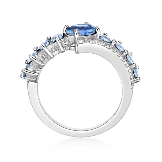Oval and Round Sky Blue Topaz with White Topaz Bypass Ring in Sterling Silver