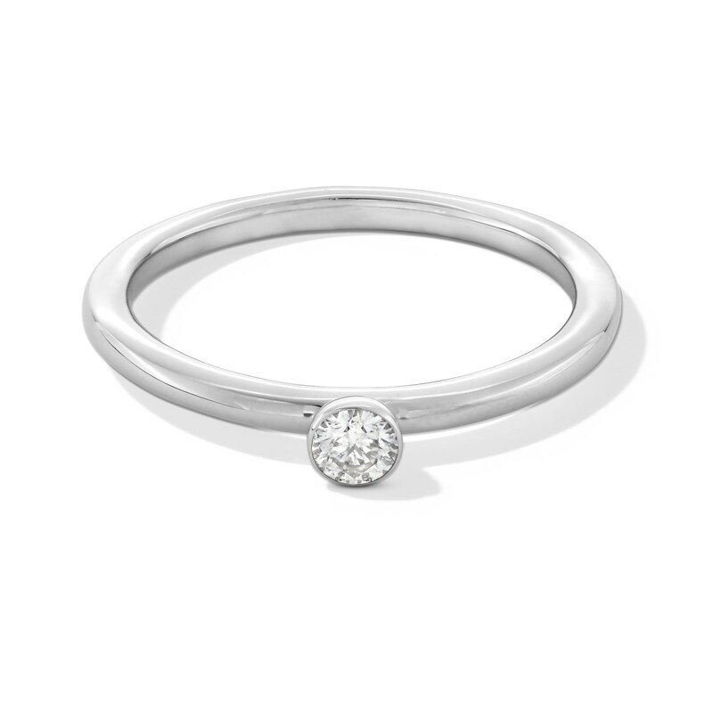 Main Image 1 of 1/8 CT. Diamond Bezel-Set Solitaire Stackable Anniversary Band in 10K White Gold (I/I2)
