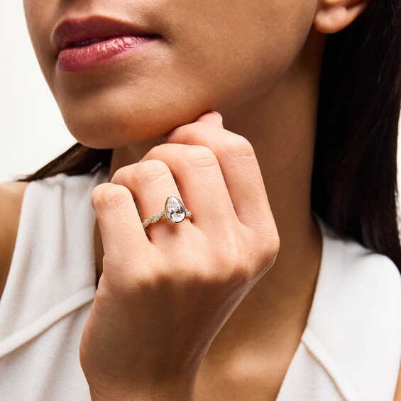 2-1/3 CT. T.w. Pear-Shaped Certified Lab-Grown Diamond Bezel-Set Twist Shank Engagement Ring in 14K Gold (F/Vs2)