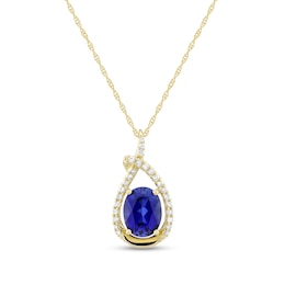 Oval Blue Lab-Created Sapphire and 1/6 CT. T.W. Diamond Open Teardrop Pendant in 10K Gold