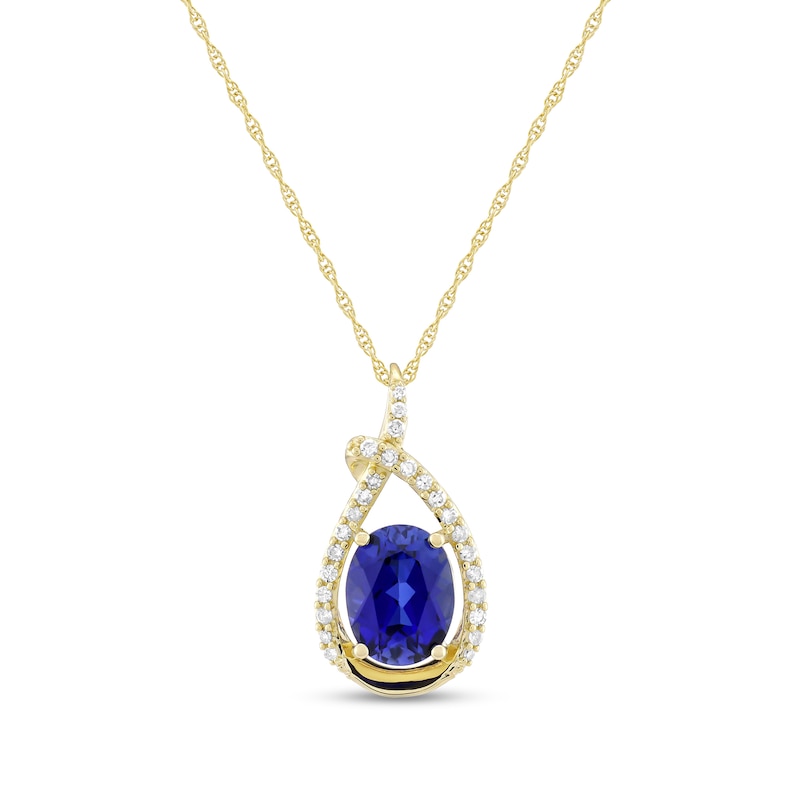Main Image 1 of Oval Blue Lab-Created Sapphire and 1/6 CT. T.W. Diamond Open Teardrop Pendant in 10K Gold