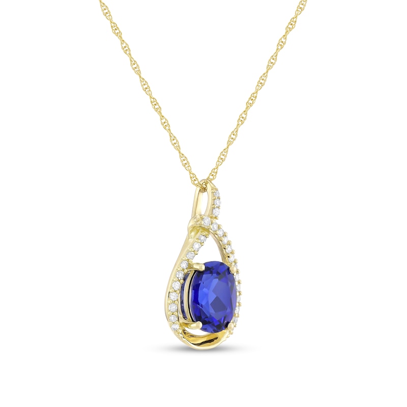 Main Image 2 of Oval Blue Lab-Created Sapphire and 1/6 CT. T.W. Diamond Open Teardrop Pendant in 10K Gold