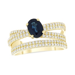 Oval Blue Sapphire and 5/8 CT. T.W. Diamond Double Row Crossover Orbit Ring in 10K Gold
