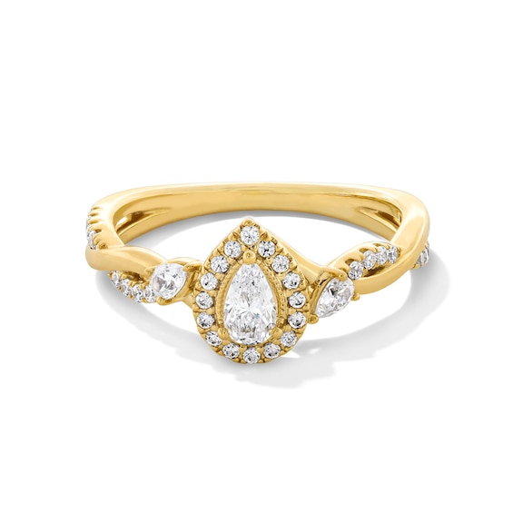 1/2 CT. T.w. Pear-Shaped Diamond Frame Twist Shank Engagement Ring in 14K Gold