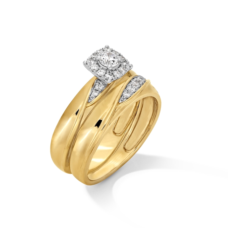 Main Image 4 of 3/8 CT. T.W. Diamond Cushion Frame Twist Wedding Ensemble in 10K Gold - Size 7 and 10