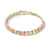 Thumbnail Image 1 of 6.25mm "XO" Heart Link Stampato Bracelet in Hollow 10K Tri-Tone Gold - 7.25"