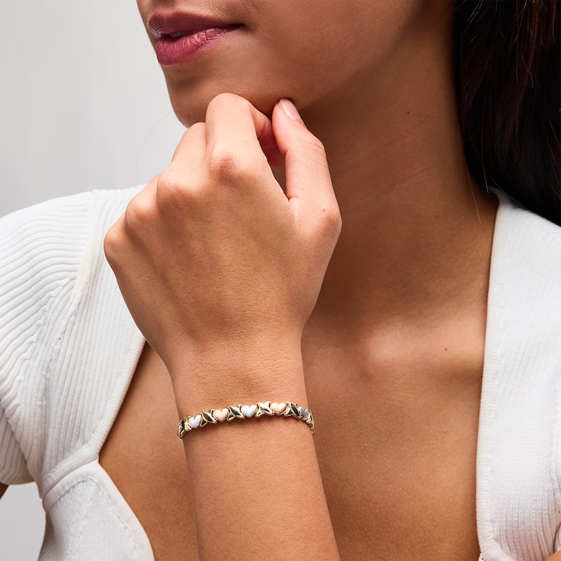 Main Image 2 of 6.25mm "XO" Heart Link Stampato Bracelet in Hollow 10K Tri-Tone Gold - 7.25"
