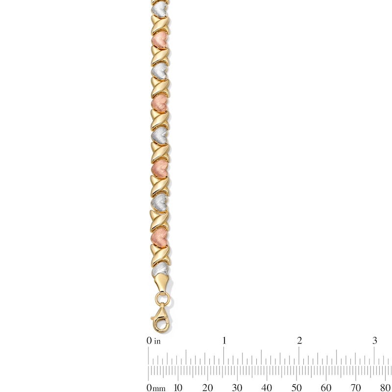Main Image 3 of 6.25mm "XO" Heart Link Stampato Bracelet in Hollow 10K Tri-Tone Gold - 7.25"