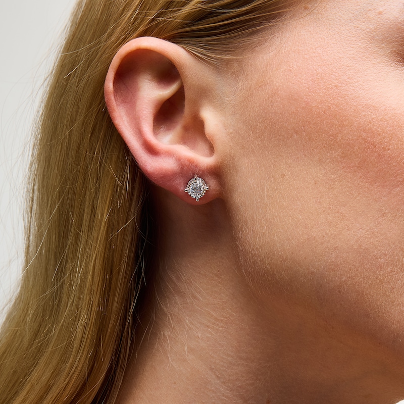 Main Image 2 of 1 CT. T.W. Diamond Miracle Solitaire Stud Earrings in 14K White Gold