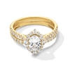 Thumbnail Image 1 of 1-1/2 CT. T.W. Oval Diamond Frame Bridal Set in 14K Gold