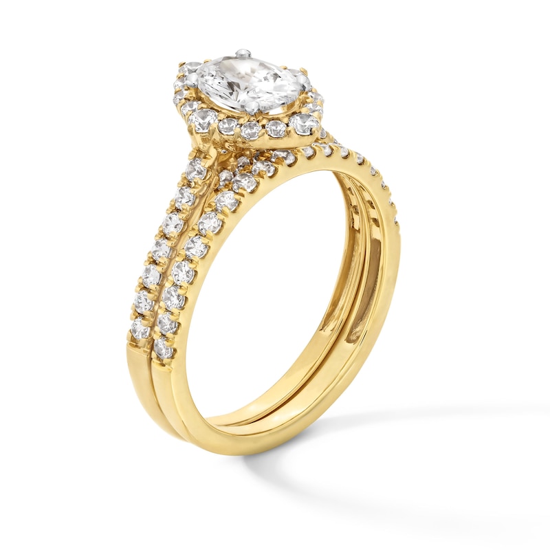 Main Image 3 of 1-1/2 CT. T.W. Oval Diamond Frame Bridal Set in 14K Gold