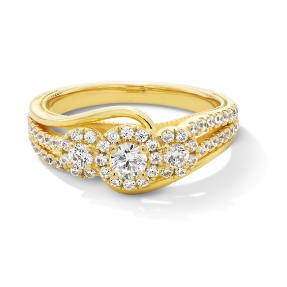 3/4 CT. T.w. Pear-Shaped and Round Diamond Frame Past Present Future® Double Row Shank Engagement Ring in 10K Gold