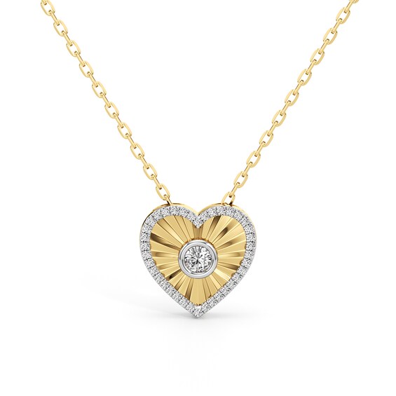 1/4 CT. T.w. Diamond Frame Sunburst Heart Medallion Pendant in Sterling Silver with 24K Gold Plate