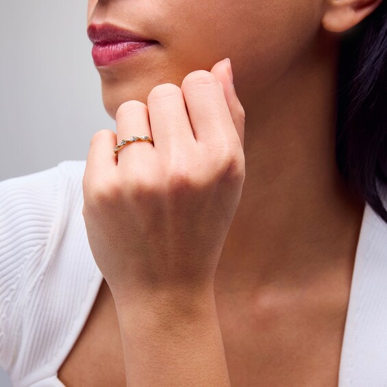 1/5 CT. T.w. Diamond Trio Twist Band in 10K Gold