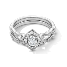 5/8 CT. T.W. Oval Diamond Quatrefoil Frame Art Deco Vintage-Style Bridal Set in 14K White Gold