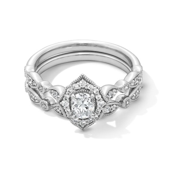 5/8 CT. T.w. Oval Diamond Quatrefoil Frame Art Deco Vintage-Style Bridal Set in 14K White Gold