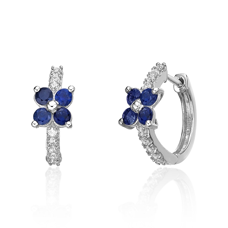 Main Image 1 of Blue Sapphire and 1/8 CT. T.W. Diamond Flower Huggie Hoop Earrings in 10K White Gold