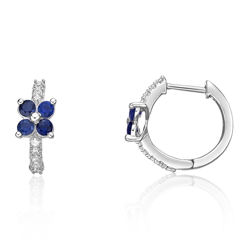 Main Image 2 of Blue Sapphire and 1/8 CT. T.W. Diamond Flower Huggie Hoop Earrings in 10K White Gold