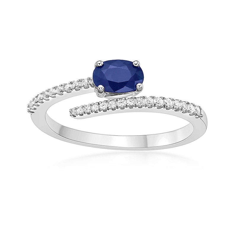 Main Image 1 of Oval Blue Sapphire and 1/8 CT. T.W. Diamond Bypass Ring in 10K White Gold