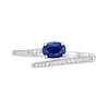 Thumbnail Image 2 of Oval Blue Sapphire and 1/8 CT. T.W. Diamond Bypass Ring in 10K White Gold