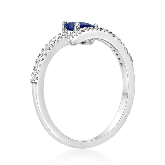 Oval Blue Sapphire and 1/8 CT. T.w. Diamond Bypass Ring in 10K White Gold