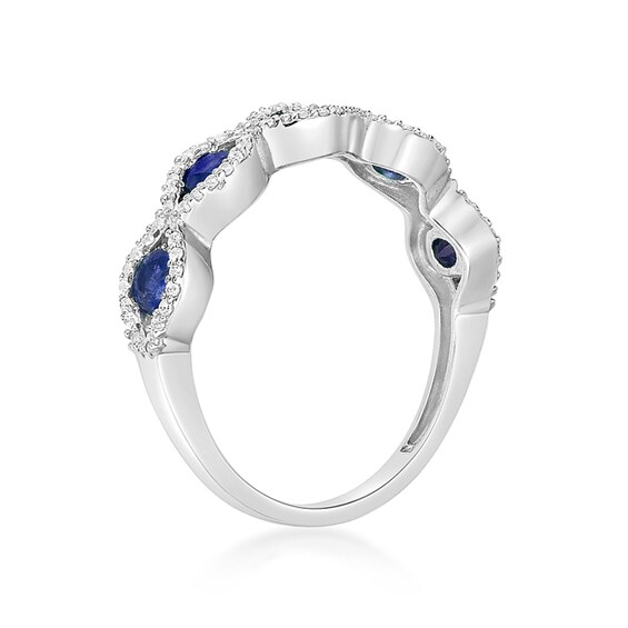 Blue Sapphire and 1/4 CT. T.w. Diamond Five Stone Scallop Edge Ring in 10K White Gold