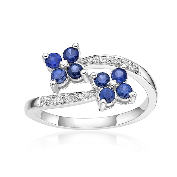 Blue Sapphire and 1/15 CT. T.w. Diamond Double Flower Bypass Ring 10K White Gold