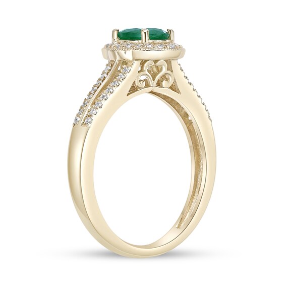 Oval Emerald and 1/4 CT. T.w. Diamond Frame Split Shank Ring 10K Gold