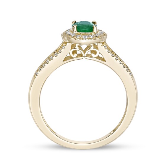 Oval Emerald and 1/4 CT. T.w. Diamond Frame Split Shank Ring 10K Gold