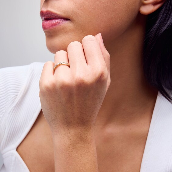 1/4 CT. T.w. Diamond Crossover Band in 10K Gold