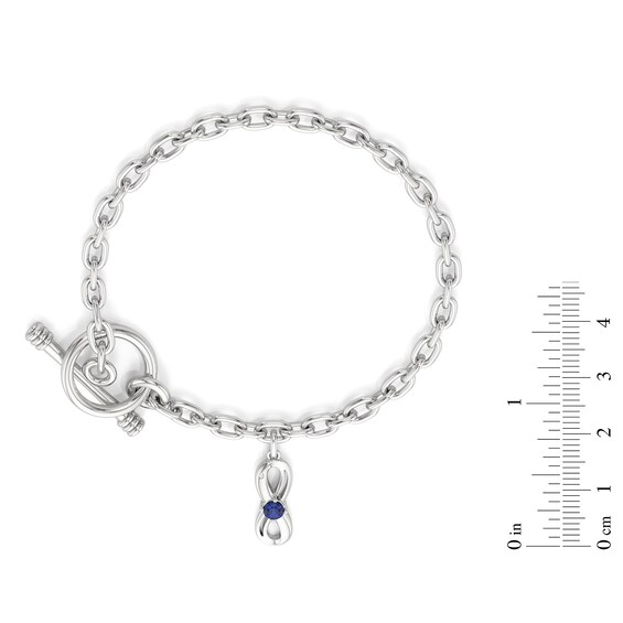 Blue and White Lab-Created Sapphire Infinity Charm Toggle Bracelet in Sterling Silver - 7.5"
