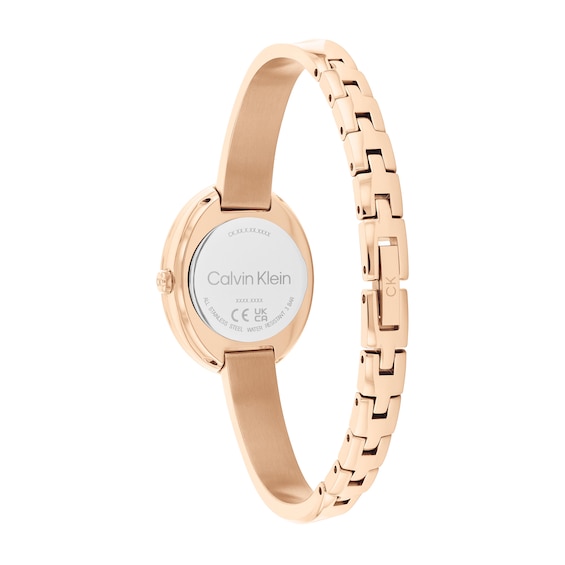 Ladiesâ Calvin Klein Twisted Bezel Rose-Tone IP Bangle Watch with Black Dial (Model: 25100057)