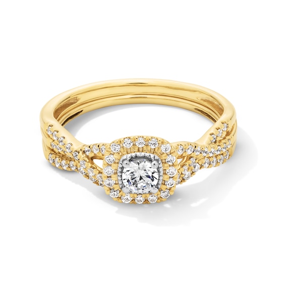 1/2 CT. T.w. Certified Lab-Grown Diamond Cushion Frame Twist Shank Bridal Set in 10K Gold (F/Si2)