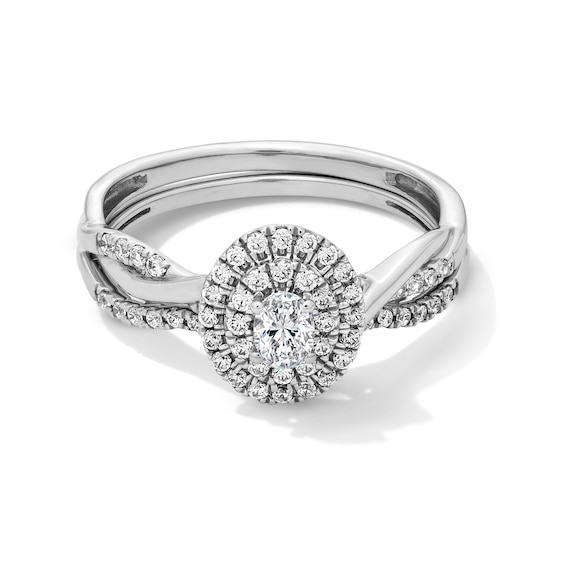 1/2 CT. T.w. Oval Certified Lab-Grown Diamond Double Frame Twist Shank Bridal Set in 10K White Gold (F/Si2)