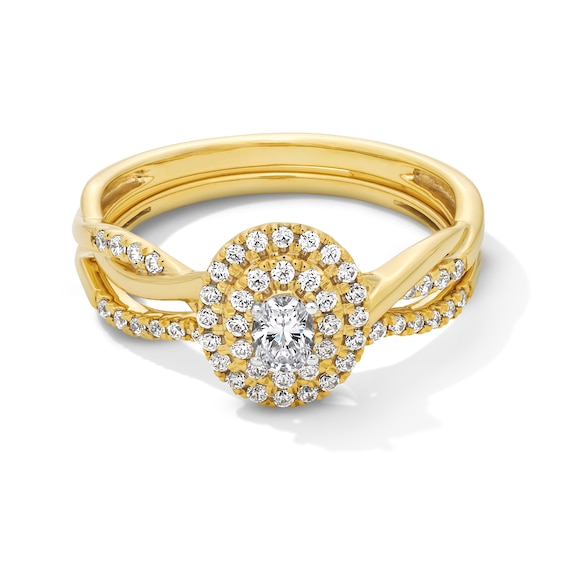 1/2 CT. T.w. Oval Certified Lab-Grown Diamond Double Frame Twist Shank Bridal Set in 10K Gold (F/Si2)