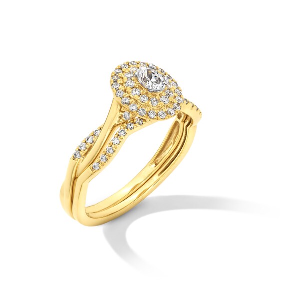 1/2 CT. T.w. Oval Certified Lab-Grown Diamond Double Frame Twist Shank Bridal Set in 10K Gold (F/Si2)