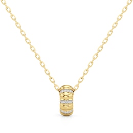 1/10 CT. T.W. Diamond Textured Puff Drop Pendant in Sterling Silver with 24K Gold Plate