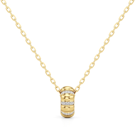 1/10 CT. T.w. Diamond Textured Puff Drop Pendant in Sterling Silver with 24K Gold Plate