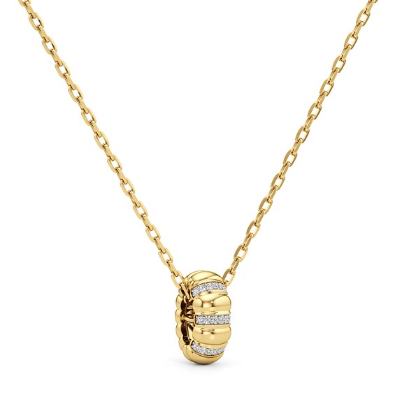 1/10 CT. T.w. Diamond Textured Puff Drop Pendant in Sterling Silver with 24K Gold Plate