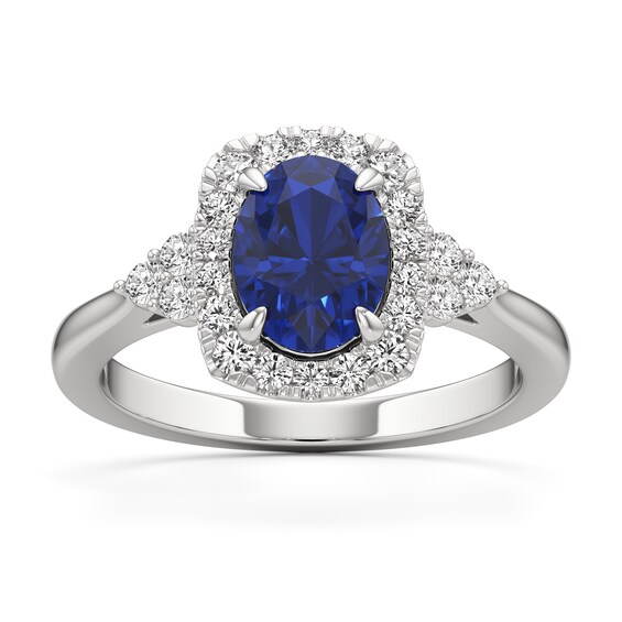 Oval Blue Sapphire and 1/3 CT. T.w. Lab-Grown Diamond Cushion Frame Tri-Sides Ring in 14K White Gold