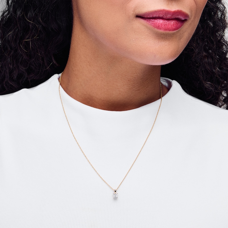 Main Image 2 of 1/10 CT. Princess-Cut Diamond Miracle Solitaire Pendant in Sterling Silver with 14K Gold Plate (J/I3)